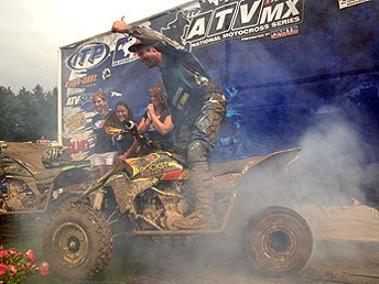 gust thrives in the rain, Gust does a burnout on the podium after winning the American Suzuki Summer National