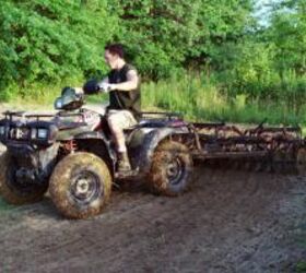 reasons to ride your utility, We used a Polaris Sportsman 700 to help haul tools back to the track and pull a disc to groom the soil