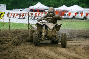 kiser wins titan gncc, A muddy Brandon Sommers rounds the corner