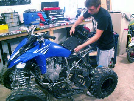 yamaha raptor 250 project part 1, Loosen the Allen bolt holding the intake boot to the carburetor and remove the air box assembly