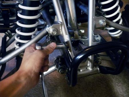 yamaha raptor 250 project part 3, First remove the front bumper by loosening the four bolts that hold it in place