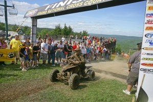 wolf earns historic win at snowshoe gncc, Brian Wolf crosses the finish line