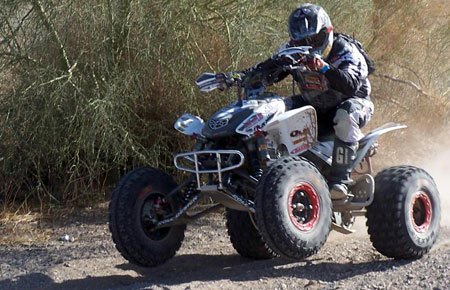 team christy podiums in first race of 2010, Dave Scott bouncing through the Arizona Desert