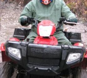 2008 polaris sportsman 500 efi x2 review, ATV guide and test rider Les Pinz pushes the Polaris hard through a mud pool