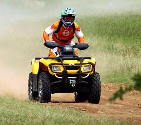2009 can am outlander 400 efi review, Can Am s Trailing Torsional Independent Suspension has fewer parts than a traditional setup which helps cut the vehicle s weight