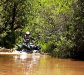 2009 yamaha grizzly 550 fi eps review, The Grizzly 550 has no trouble rolling through deep water