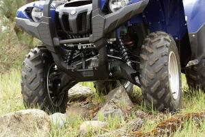 2009 yamaha grizzly 550 fi eps review, WideArc front suspension provides loads of usable ground clearance