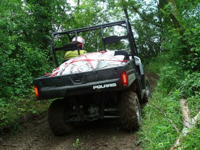 2009 polaris rangers first look, Even with 1 500 pounds in the bed the Nivomat shocks won t bottom out