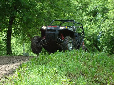 2009 polaris ranger rzr and outlaw preview, You ll have no trouble finding ways to use some the 12 inches of travel