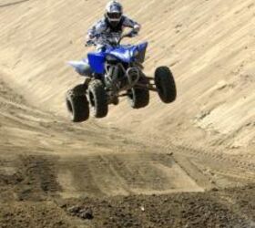 2009 yamaha yfz450r review, The YFZ450R easily powers over the doubles on the motocross track