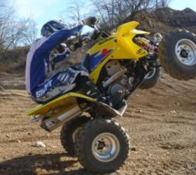 2009 suzuki quadsport z400 review, Throttle response is much improved and it s very easy to get the front wheels off the ground