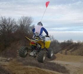 2009 suzuki quadsport z400 review, Landing jumps isn t so hard on the body thanks to a plusher suspension