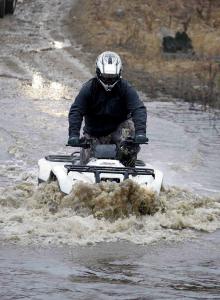 2009 honda fourtrax rancher at review, The Rancher AT had no trouble tackling the rainy Quebec wilderness