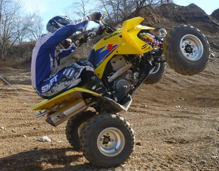 two brothers exhaust and juicebox review, Lifting the front end of the Z400 was a lot easier once we attached the slip on exhaust and fuel controller