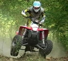 2009 polaris scrambler 500 44 review, The Scrambler needs a bit of body English to lift up the front end