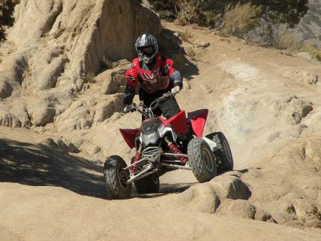 2009 polaris outlaw 525 irs review, The Outlaw shines on rocky and off camber trails