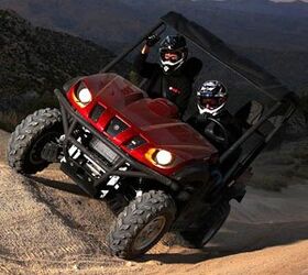 2009 yamaha rhino 700 fi sport edition review, Opting for the roof aluminum wheels and upgraded suspension of the Sport Edition makes a big difference