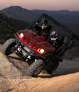 2009 yamaha rhino 700 fi sport edition review, Opting for the roof aluminum wheels and upgraded suspension of the Sport Edition makes a big difference