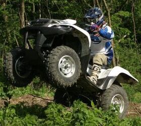 2009 suzuki kingquad 750 power steering review, The powerful 722cc engine can get the wheels up with ease