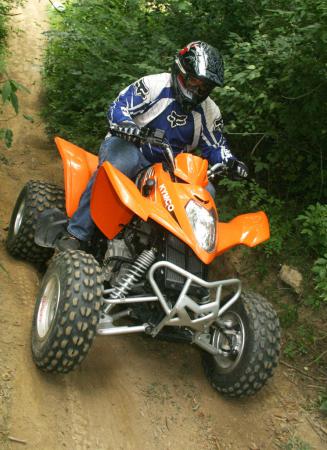 2009 kymco mongoose 300 review, The Mongoose 300 s disc brakes are plenty powerful and the Kenda Klaw tires will provide many hours of enjoyment