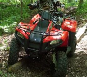 2010 polaris trail boss 330 review, Suspension travel was increased on both the front and rear shocks
