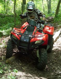 2010 polaris trail boss 330 review, Suspension travel was increased on both the front and rear shocks