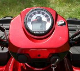 2009 polaris sportsman 800 efi touring review, The large gauge pod displays all the essentials Note the rocker switch on the right side for opening or locking the rear differential