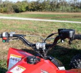 2010 polaris outlaw 450 mxr review, A lower handlebar would help the ergos on the Outlaw