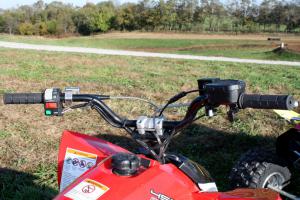 2010 polaris outlaw 450 mxr review, A lower handlebar would help the ergos on the Outlaw