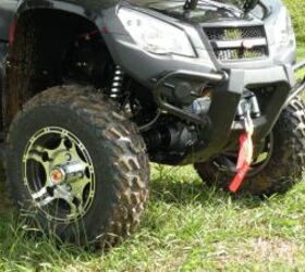 2010 kymco mxu 500 irs 44 le review, Alloy wheels and a 2 500 pound winch highlight the Limited Edition package