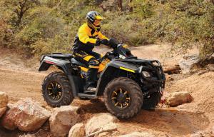 2010 can am outlander 800r efi xt p review, Stock suspension settings are fairly stiff but the shocks can be tuned to suit your riding needs