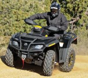 2010 can am outlander 800r efi xt p review, The factory installed winch has a 3 000 pound capacity that should be able to get you out of a jam