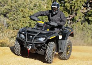 2010 can am outlander 800r efi xt p review, The factory installed winch has a 3 000 pound capacity that should be able to get you out of a jam