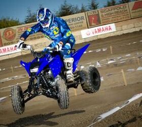 2011 yamaha raptor 125 review, Though it s not a powerhouse catching a little air is no trouble for the peppy little Raptor 125