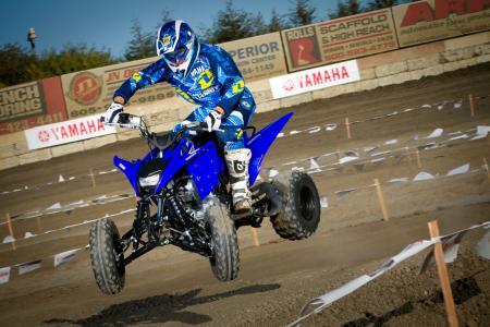 2011 yamaha raptor 125 review, Though it s not a powerhouse catching a little air is no trouble for the peppy little Raptor 125