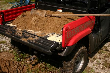 2010 honda big red muv review, The Big Red s dump box helped us haul in load after load of dirt for our patio