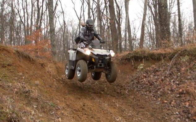 2015 polaris sportsman 570 eps vs can am outlander l 500 dps, 2015 Can Am Outlander L 500 Action Jump