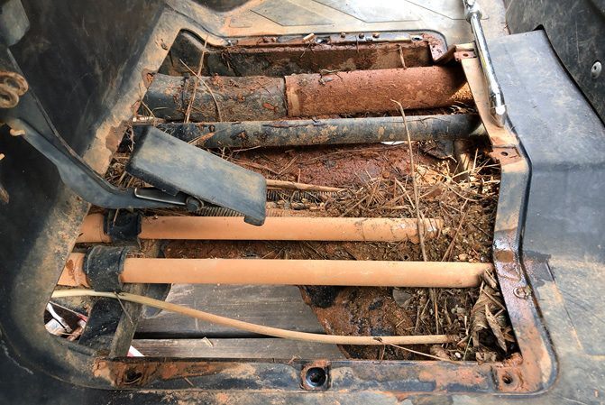 how to properly clean a muddy atv or utv, Mud skid plates