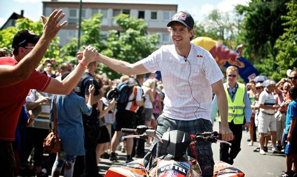 f1 champ to ride ktm atv in victory parade