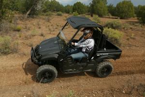 2013 yamaha rhino 700 se tactical black review, 2013 Yamaha Rhino 700 SE Action Left