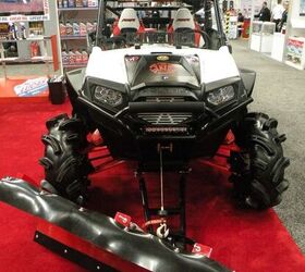 top 10 atvs and utvs from dealer expo, Lucas Oil RZR XP 900 with Plow
