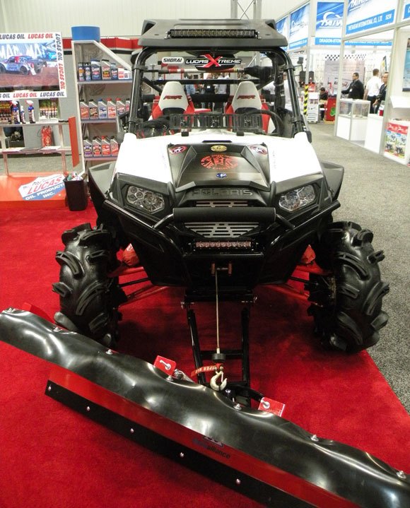 top 10 atvs and utvs from dealer expo, Lucas Oil RZR XP 900 with Plow