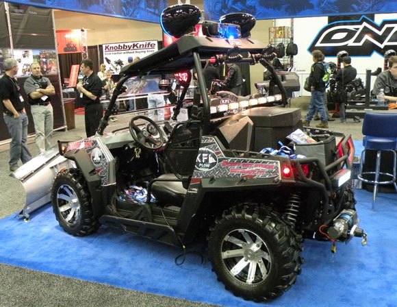 top 10 atvs and utvs from dealer expo, KFI Polaris RZR with Snow Plow