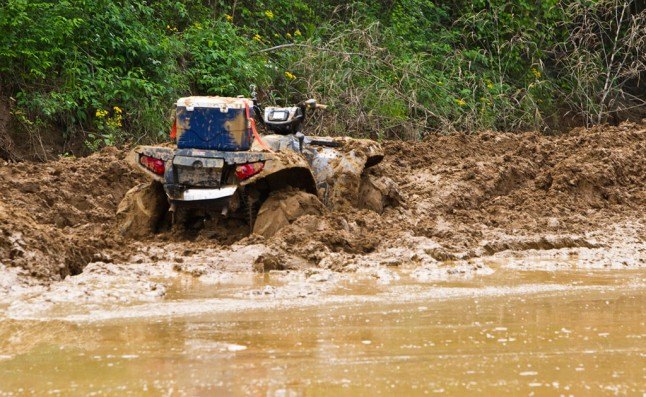 top 10 mud riding pictures, Polaris Sportsman Stuck