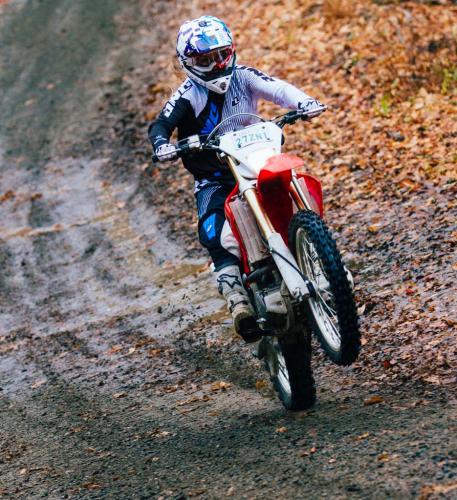 the roar of engines in parry sound video, Ami Houde Honda CRF230F