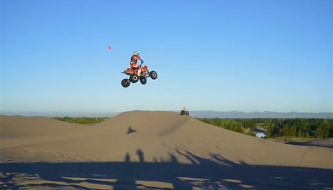 atv rider goes big at st anthony sand dunes video