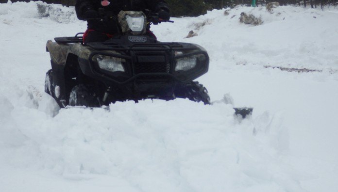 five tips for plowing snow with your atv or utv, Honda Rincon Plow