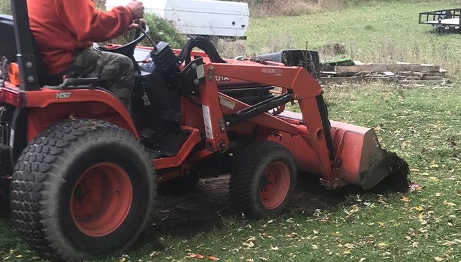 shelterlogic diy garage on a budget part 1, Tractoring