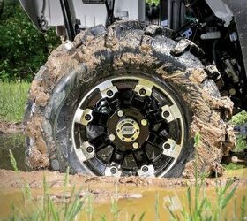grip it and rip it with moose utility division wheels and tires, Moose Utility Division tires in the mud