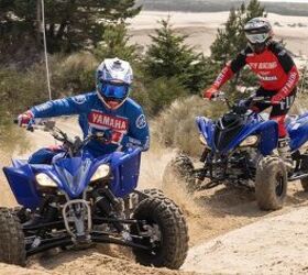 taking it to the streets towns welcome atvs promote tourism, yamaha sport atv yfz450r vs raptor 700r in the dunes